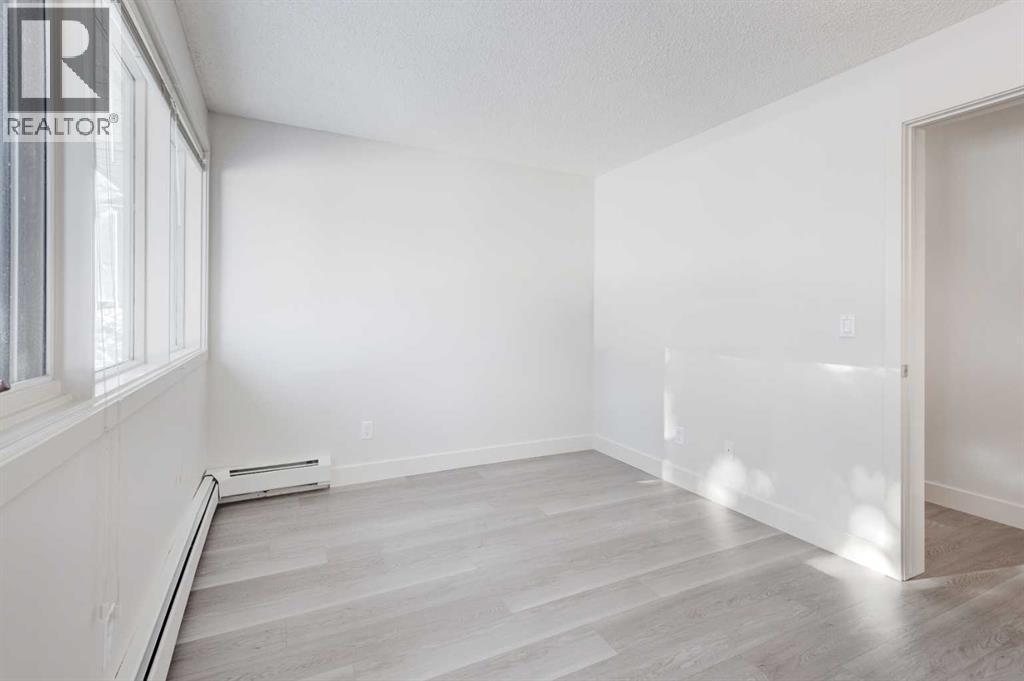 1, 101 Village Heights Sw, Calgary, AB - Indoor Photo Showing Other Room