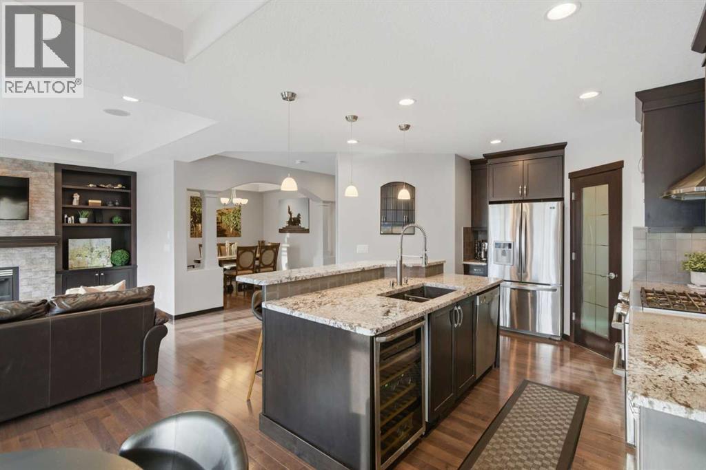 71 Panatella View Nw, Calgary, AB - Indoor Photo Showing Kitchen With Fireplace With Upgraded Kitchen