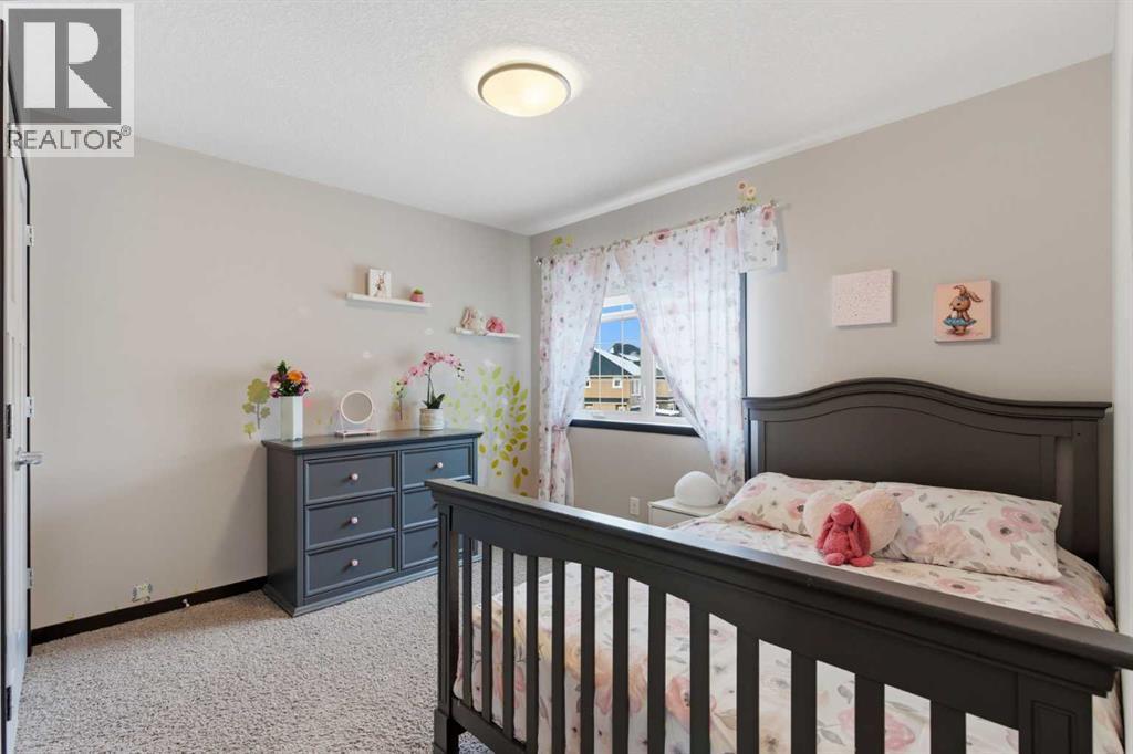 71 Panatella View Nw, Calgary, AB - Indoor Photo Showing Bedroom