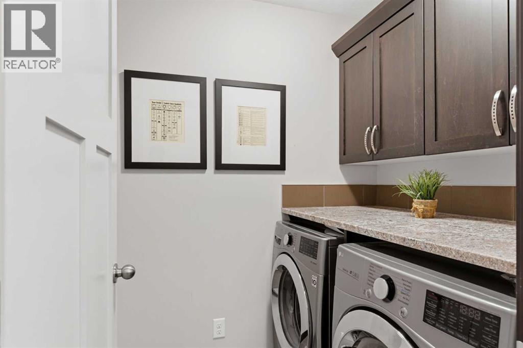 71 Panatella View Nw, Calgary, AB - Indoor Photo Showing Laundry Room