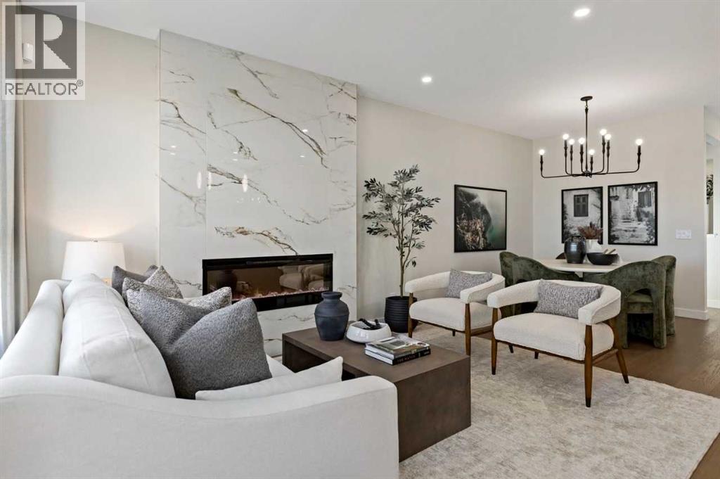 116 Huxland Close Ne, Calgary, AB - Indoor Photo Showing Living Room With Fireplace