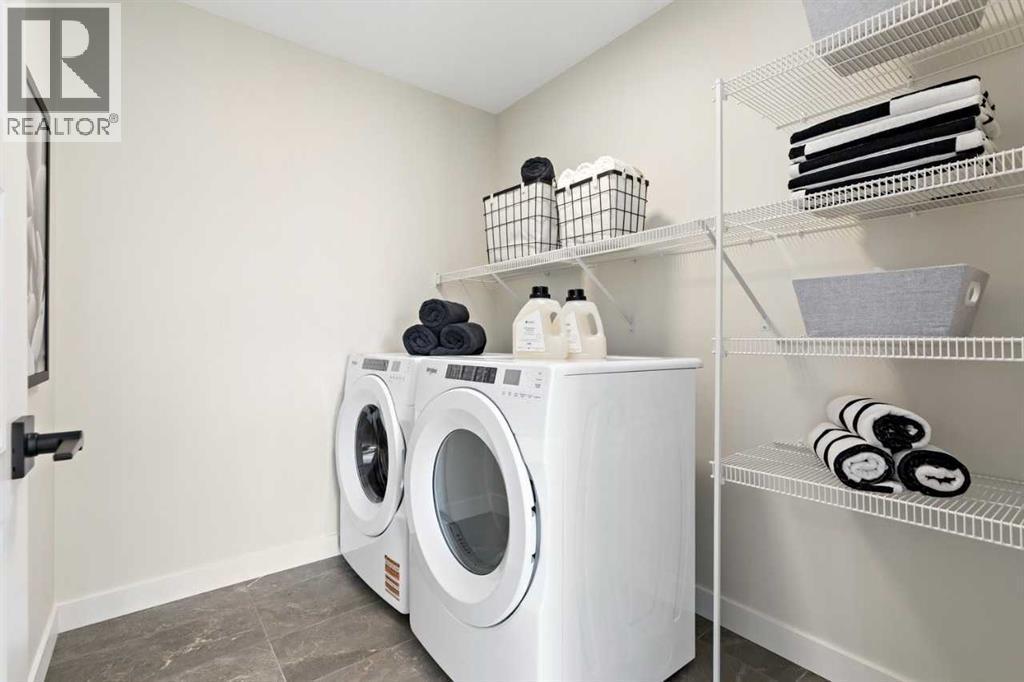 116 Huxland Close Ne, Calgary, AB - Indoor Photo Showing Laundry Room