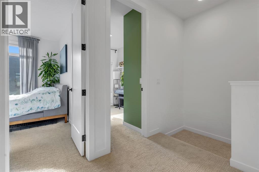 Landing - 213 Greenbriar Common Nw, Calgary, AB - Indoor Photo Showing Other Room