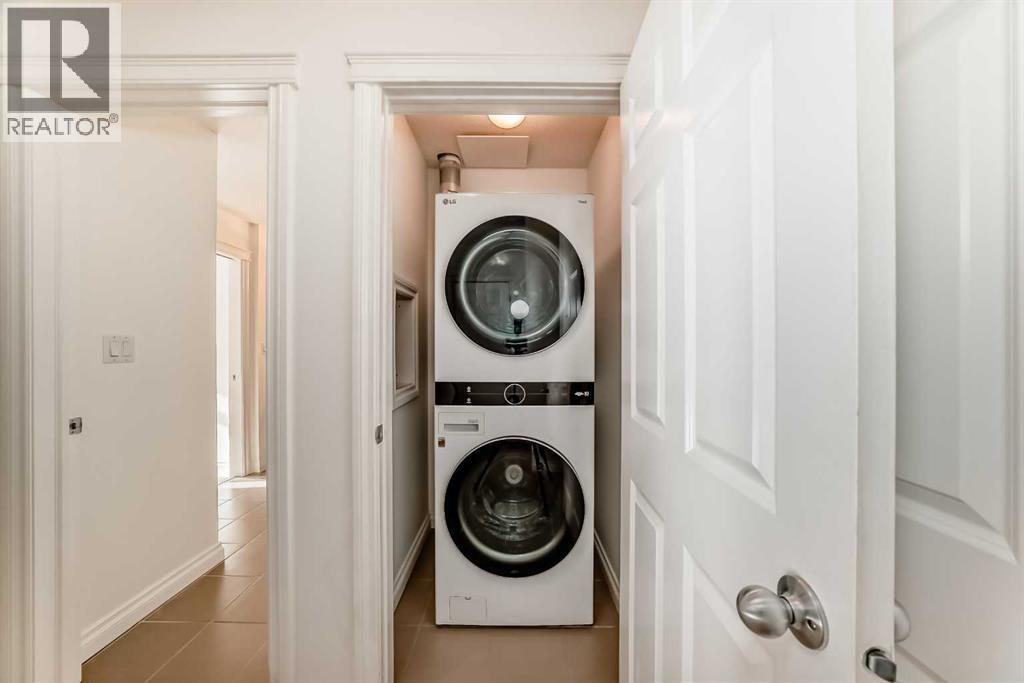 3217, 24 Hemlock Crescent Sw, Calgary, AB - Indoor Photo Showing Laundry Room