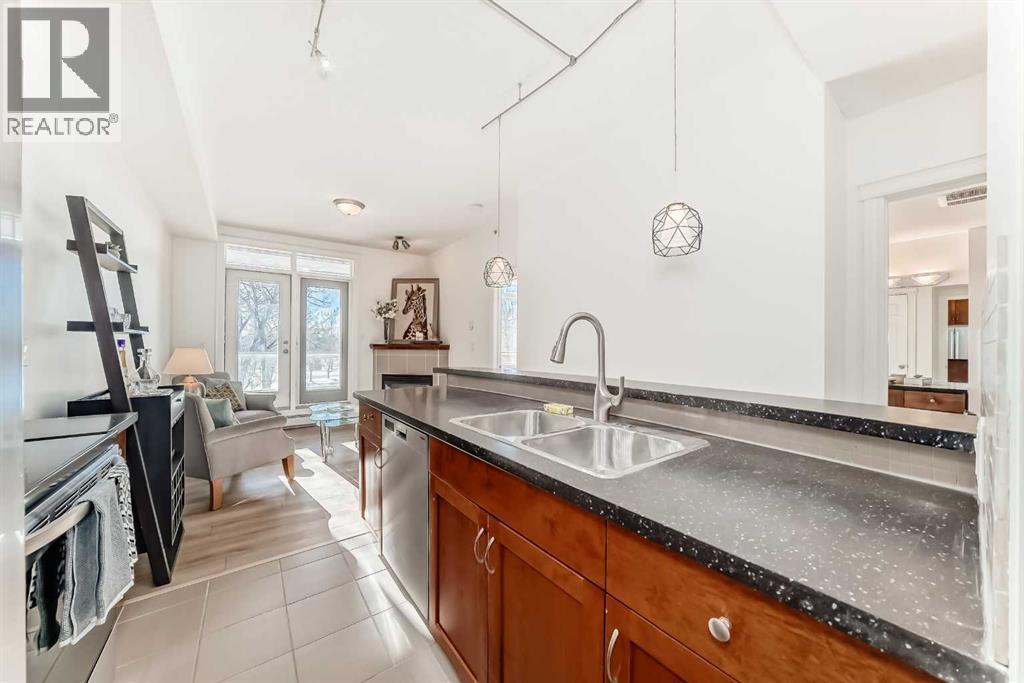 3217, 24 Hemlock Crescent Sw, Calgary, AB - Indoor Photo Showing Kitchen With Double Sink