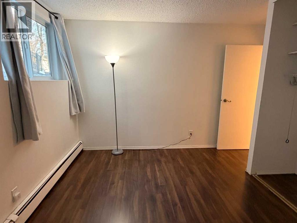 121, 1237 4 Avenue S, Lethbridge, AB - Indoor Photo Showing Other Room