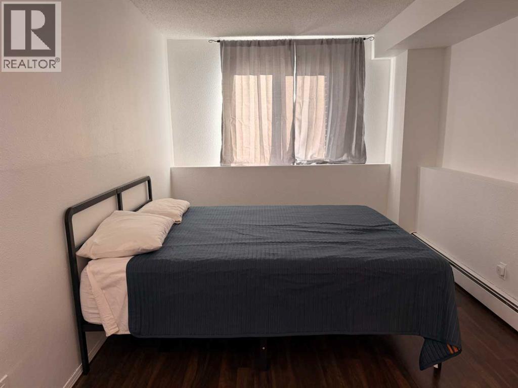 121, 1237 4 Avenue S, Lethbridge, AB - Indoor Photo Showing Bedroom