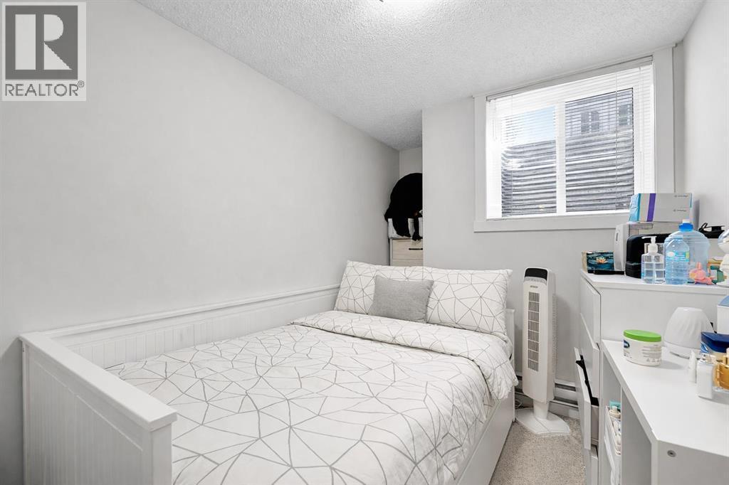 317 Cranbrook Square Se, Calgary, AB - Indoor Photo Showing Bedroom