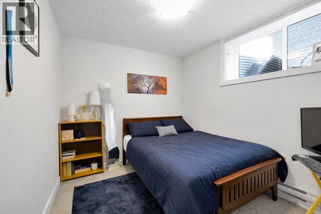 317 Cranbrook Square Se, Calgary, AB - Indoor Photo Showing Bedroom