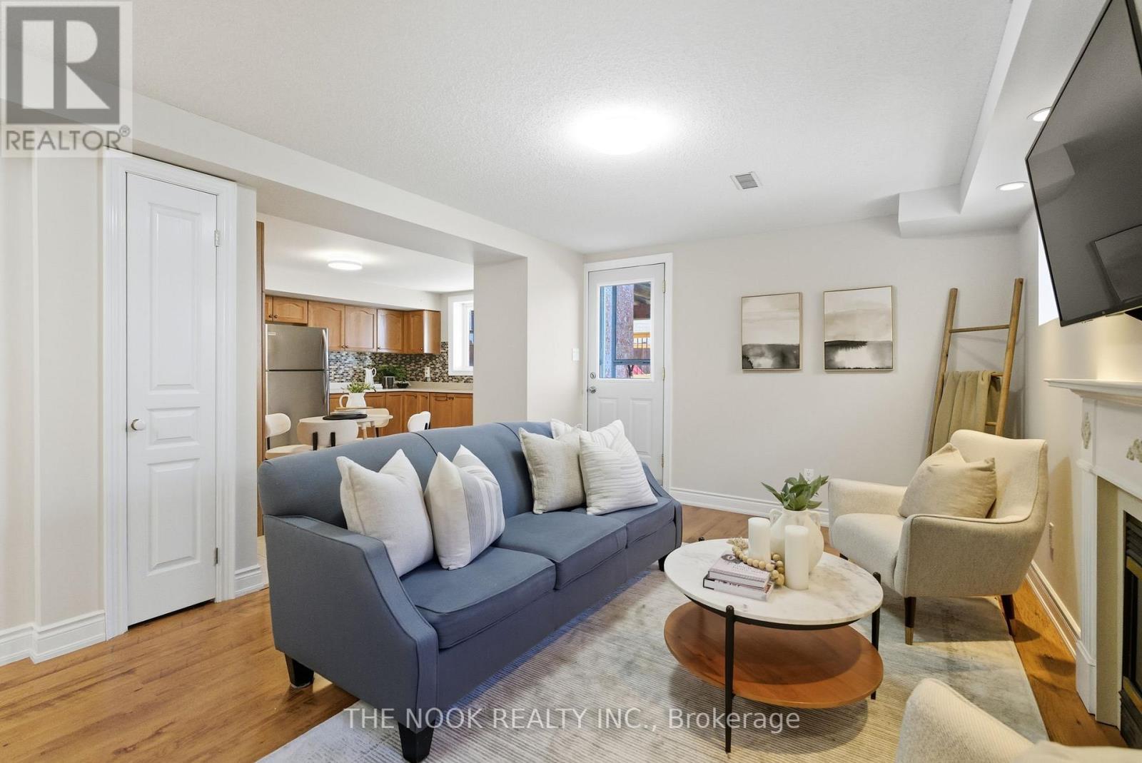 42 Bridle Court, Clarington (Courtice), ON - Indoor Photo Showing Living Room With Fireplace