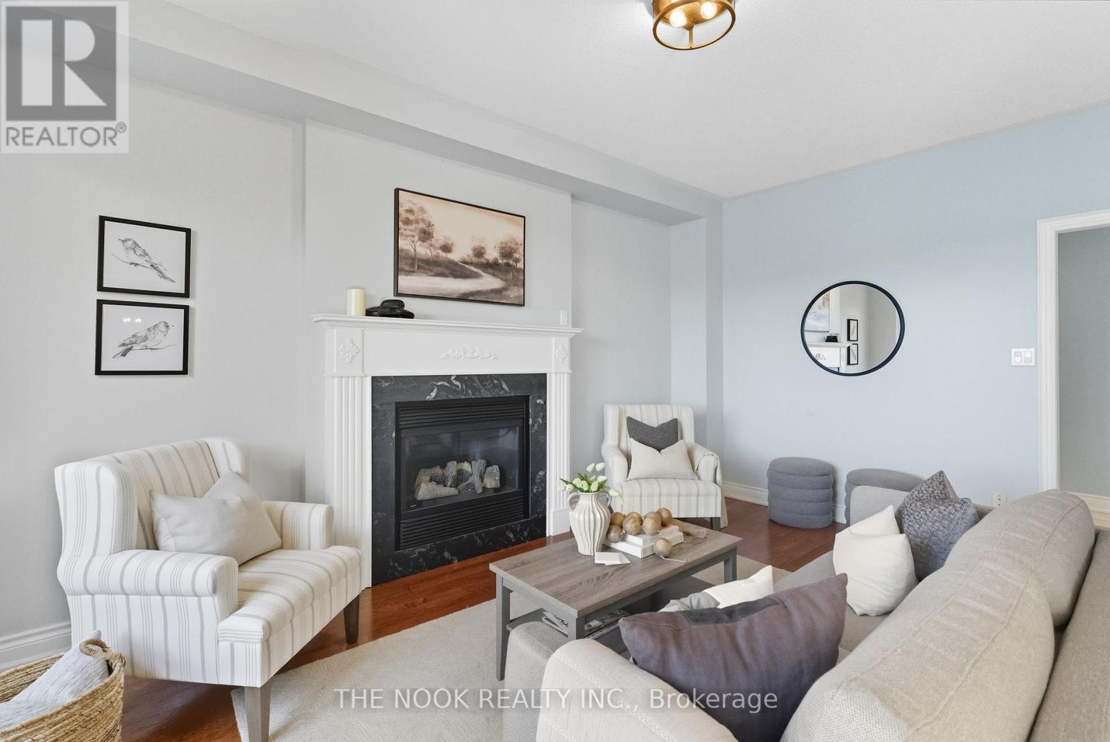 42 Bridle Court, Clarington (Courtice), ON - Indoor Photo Showing Living Room With Fireplace