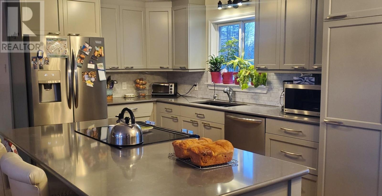 127 Peters Road, Pembroke, PE - Indoor Photo Showing Kitchen With Double Sink