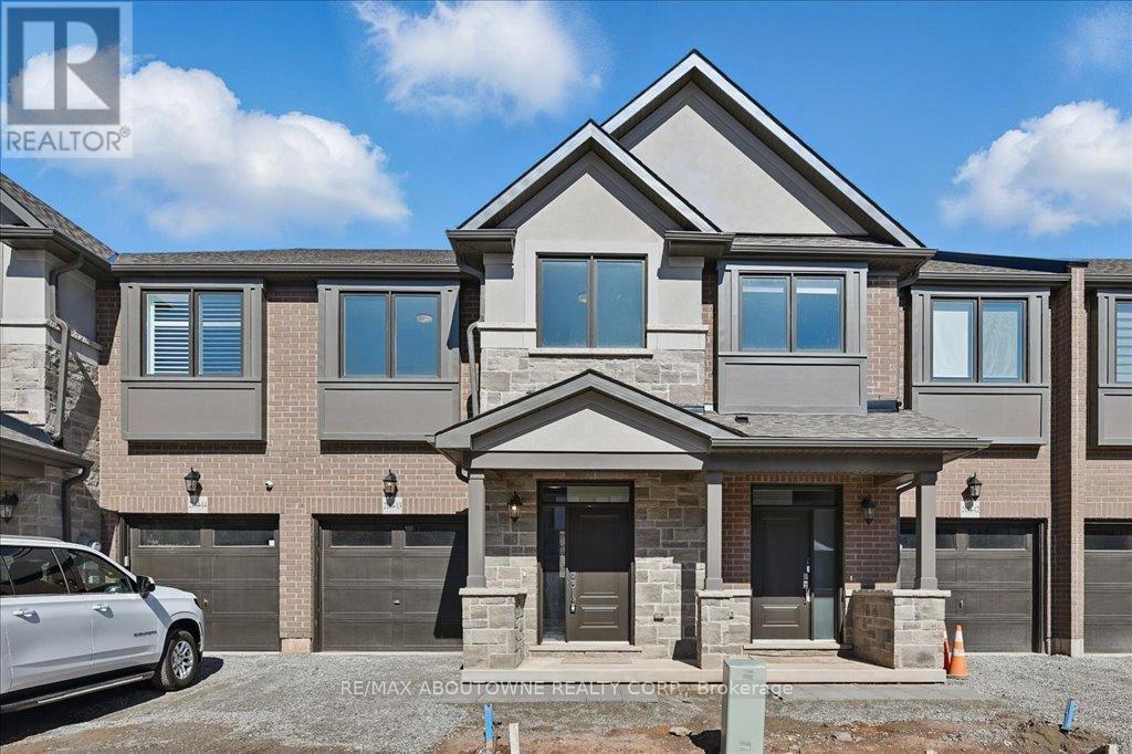 13 - 2184 Postmaster Drive, Oakville, ON - Outdoor With Facade