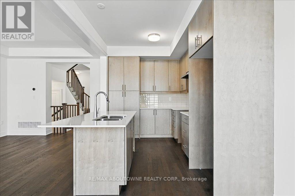 13 - 2184 Postmaster Drive, Oakville, ON - Indoor Photo Showing Kitchen With Double Sink
