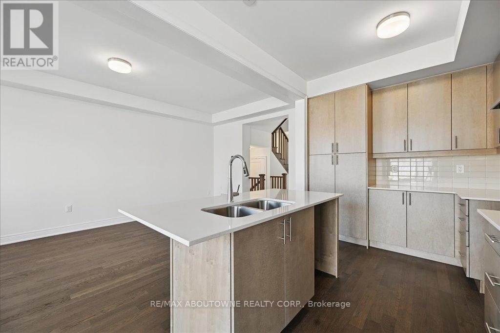 13 - 2184 Postmaster Drive, Oakville, ON - Indoor Photo Showing Kitchen With Double Sink