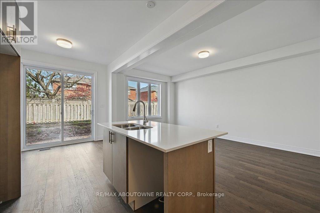 13 - 2184 Postmaster Drive, Oakville, ON - Indoor Photo Showing Kitchen With Double Sink