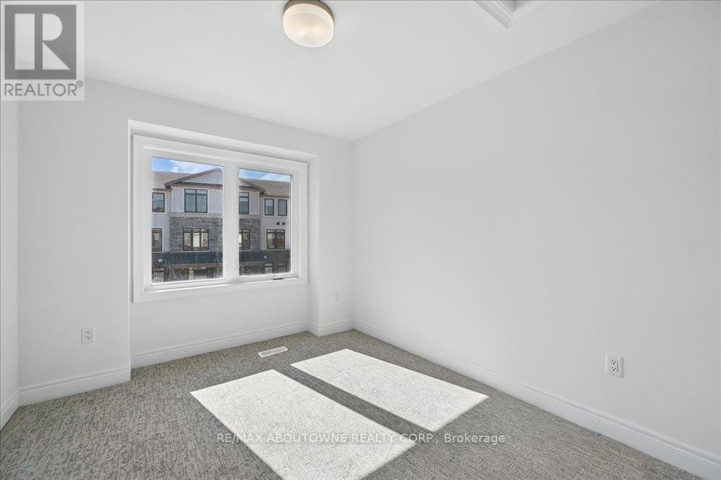 13 - 2184 Postmaster Drive, Oakville, ON - Indoor Photo Showing Other Room