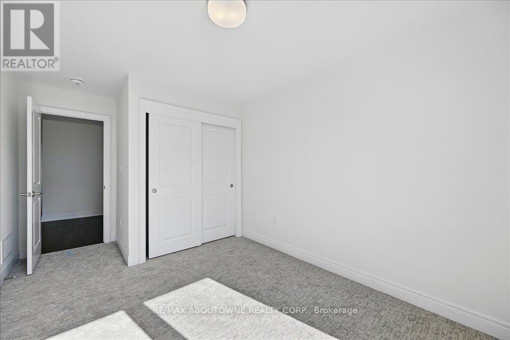 13 - 2184 Postmaster Drive, Oakville, ON - Indoor Photo Showing Other Room