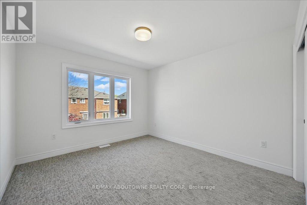 13 - 2184 Postmaster Drive, Oakville, ON - Indoor Photo Showing Other Room