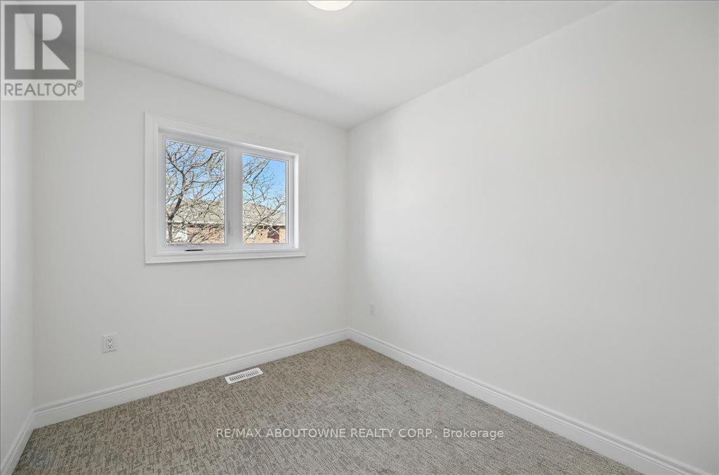 13 - 2184 Postmaster Drive, Oakville, ON - Indoor Photo Showing Other Room