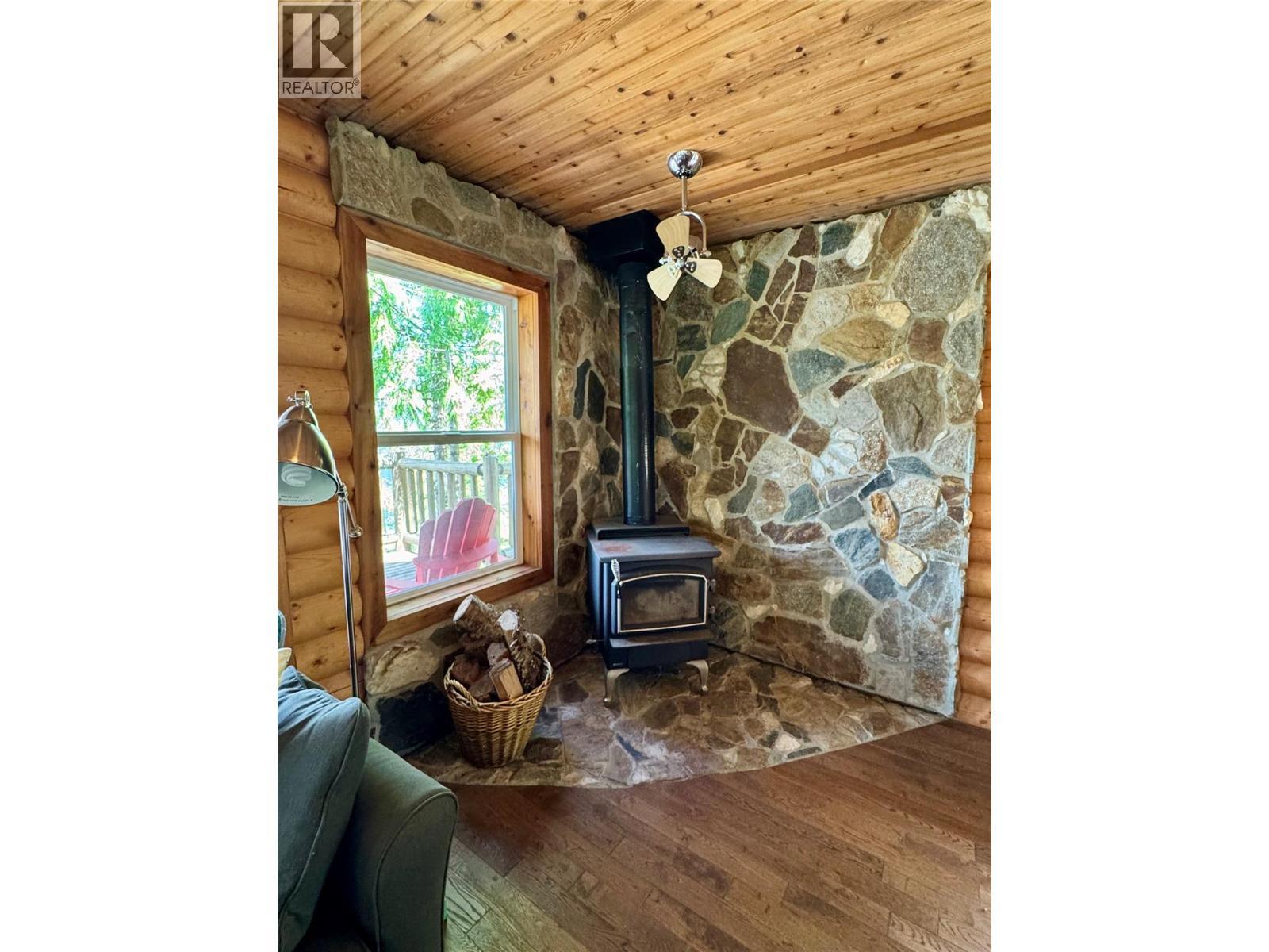 Living area - Lot 4 Pete Martin Bay, Sicamous, BC - Indoor With Fireplace