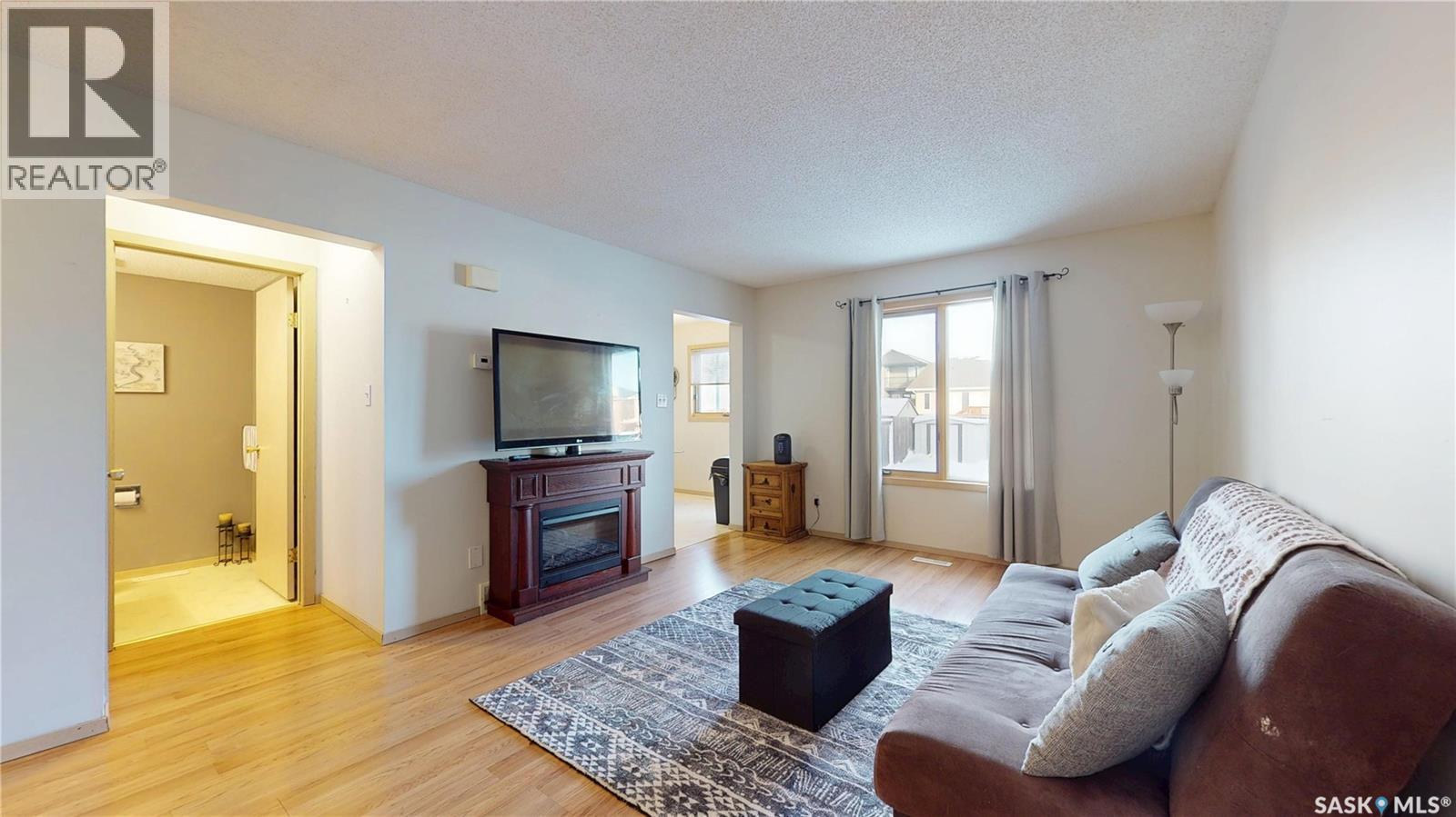 3876 7Th Avenue E, Regina, SK - Indoor Photo Showing Living Room