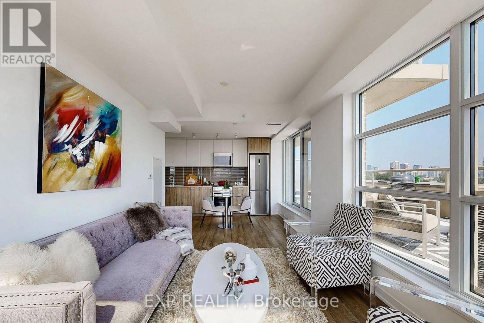 607 - 1787 St Clair Avenue W, Toronto, ON - Indoor Photo Showing Living Room
