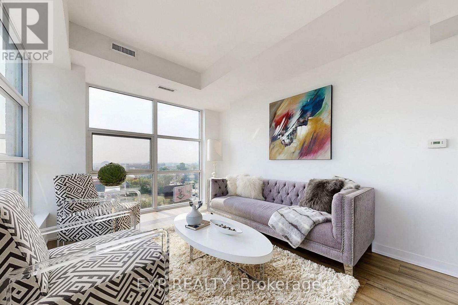 607 - 1787 St Clair Avenue W, Toronto, ON - Indoor Photo Showing Living Room