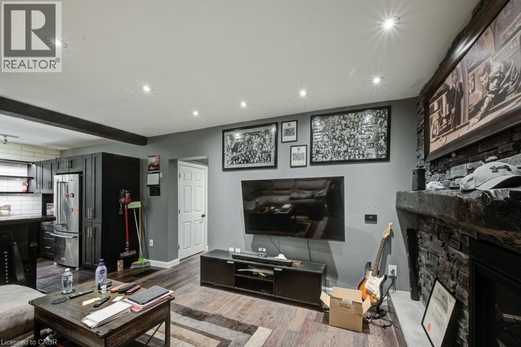83 Oxford Street, Woodstock, ON - Indoor Photo Showing Living Room With Fireplace