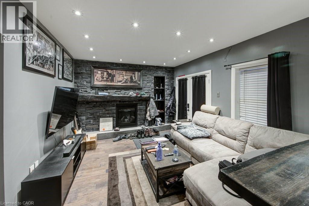 83 Oxford Street, Woodstock, ON - Indoor With Fireplace