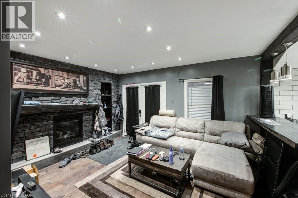 83 Oxford Street, Woodstock, ON - Indoor Photo Showing Other Room With Fireplace