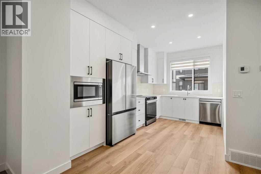 202, 550 Seton Circle Se, Calgary, AB - Indoor Photo Showing Kitchen