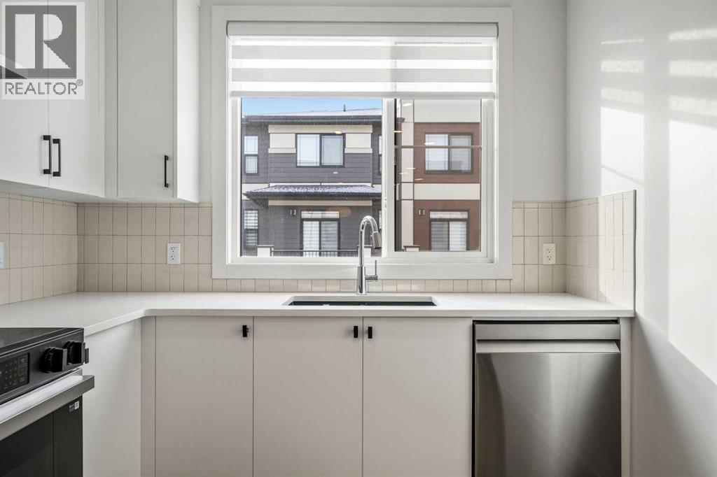 202, 550 Seton Circle Se, Calgary, AB - Indoor Photo Showing Kitchen