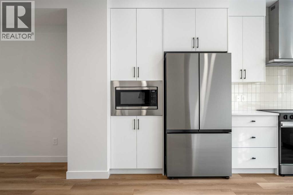 202, 550 Seton Circle Se, Calgary, AB - Indoor Photo Showing Kitchen