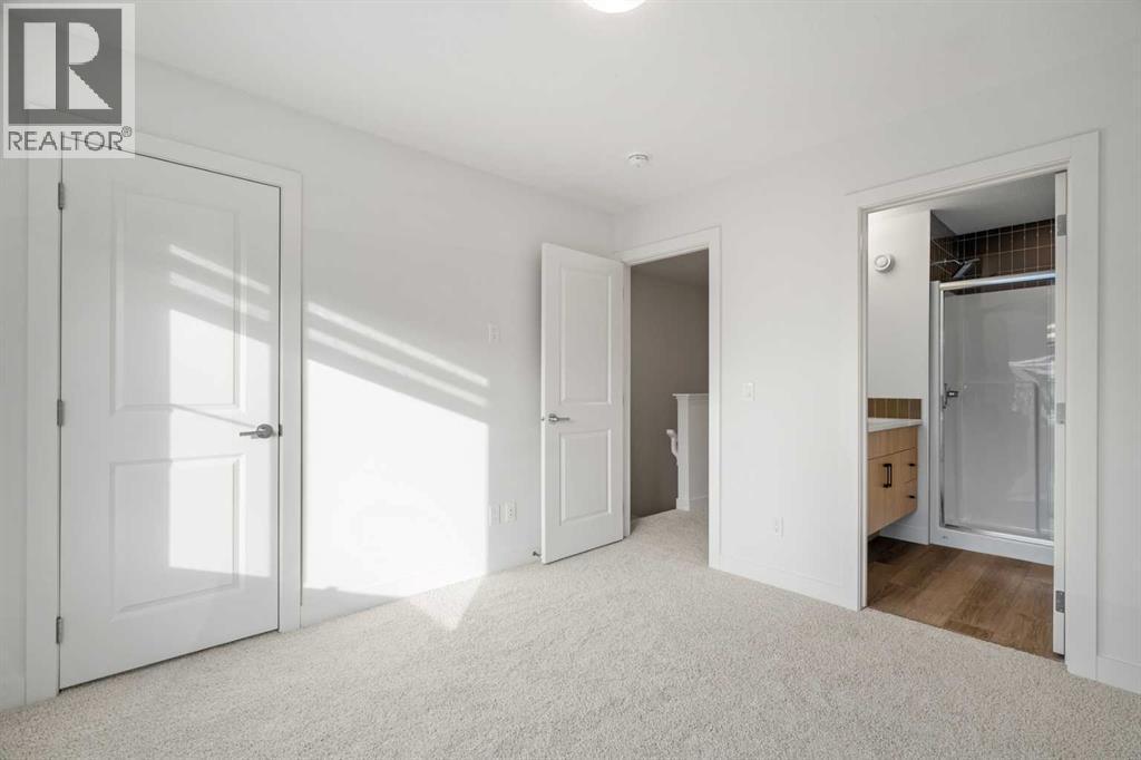 202, 550 Seton Circle Se, Calgary, AB - Indoor Photo Showing Other Room