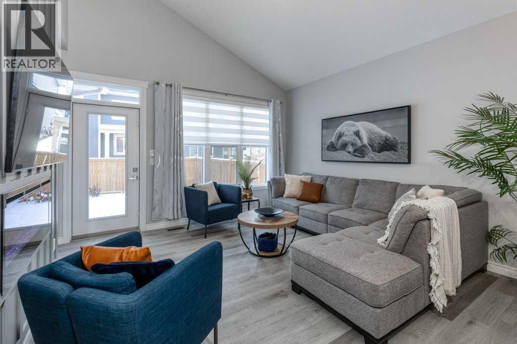 380 Rivercrest View, Cochrane, AB - Indoor Photo Showing Living Room