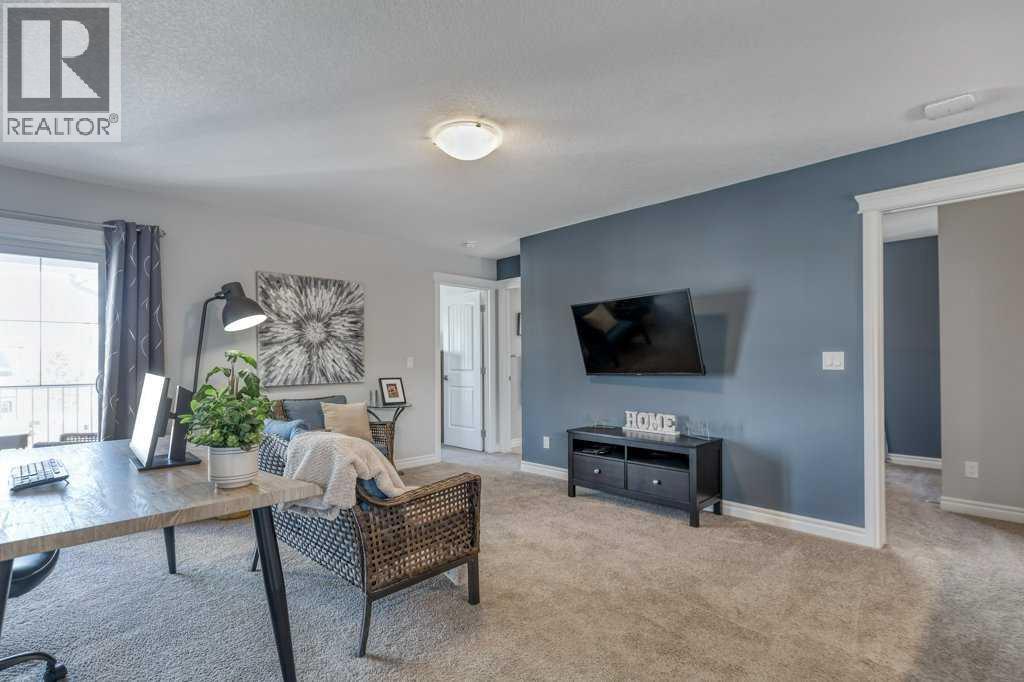 380 Rivercrest View, Cochrane, AB - Indoor Photo Showing Living Room
