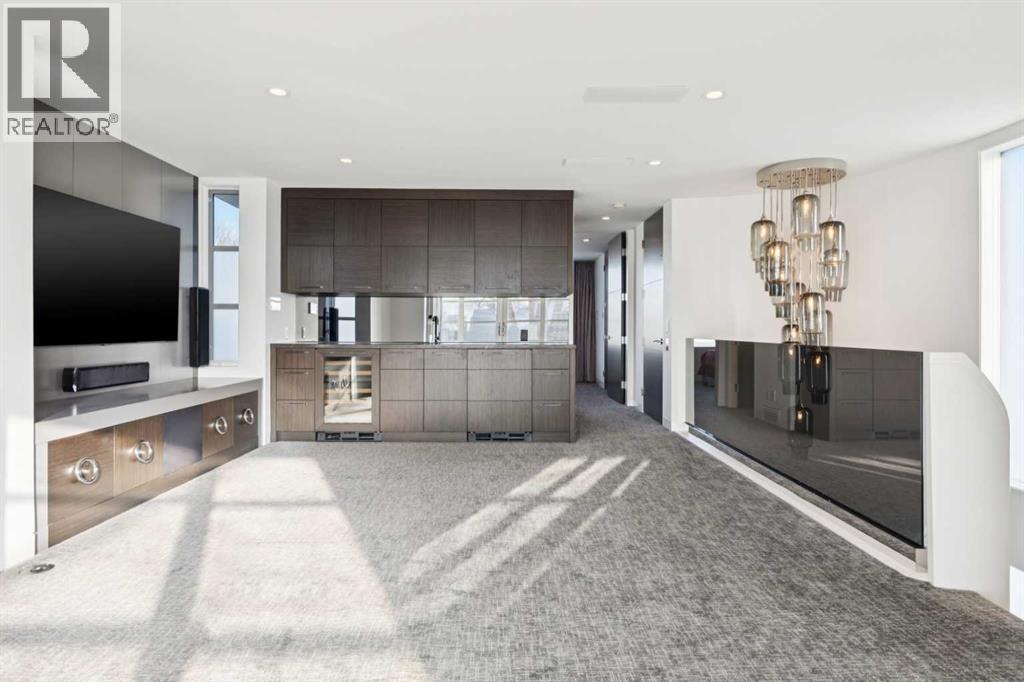 WET BAR WITH SUBZERO WINE FRIDGE AND SUBZERO BAR FRIDGE - 530 Crescent Road Nw, Calgary, AB - Indoor Photo Showing Other Room