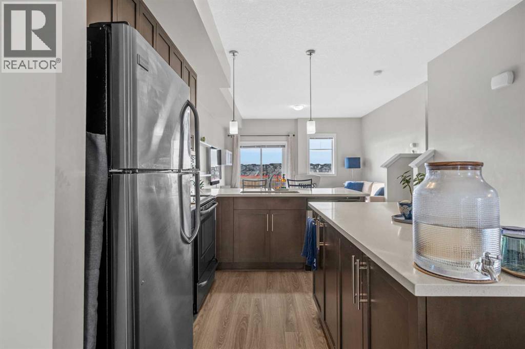 51 Redstone Circle Ne, Calgary, AB - Indoor Photo Showing Kitchen With Stainless Steel Kitchen With Double Sink With Upgraded Kitchen