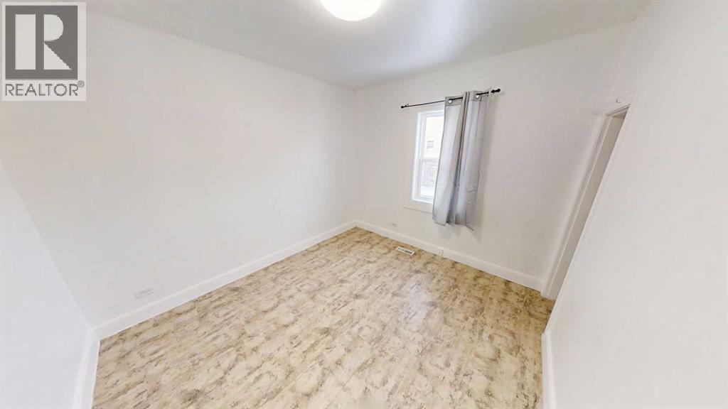 1505 8 Avenue S, Lethbridge, AB - Indoor Photo Showing Other Room