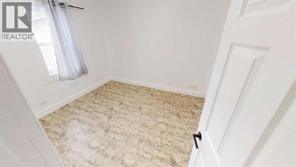 1505 8 Avenue S, Lethbridge, AB - Indoor Photo Showing Other Room