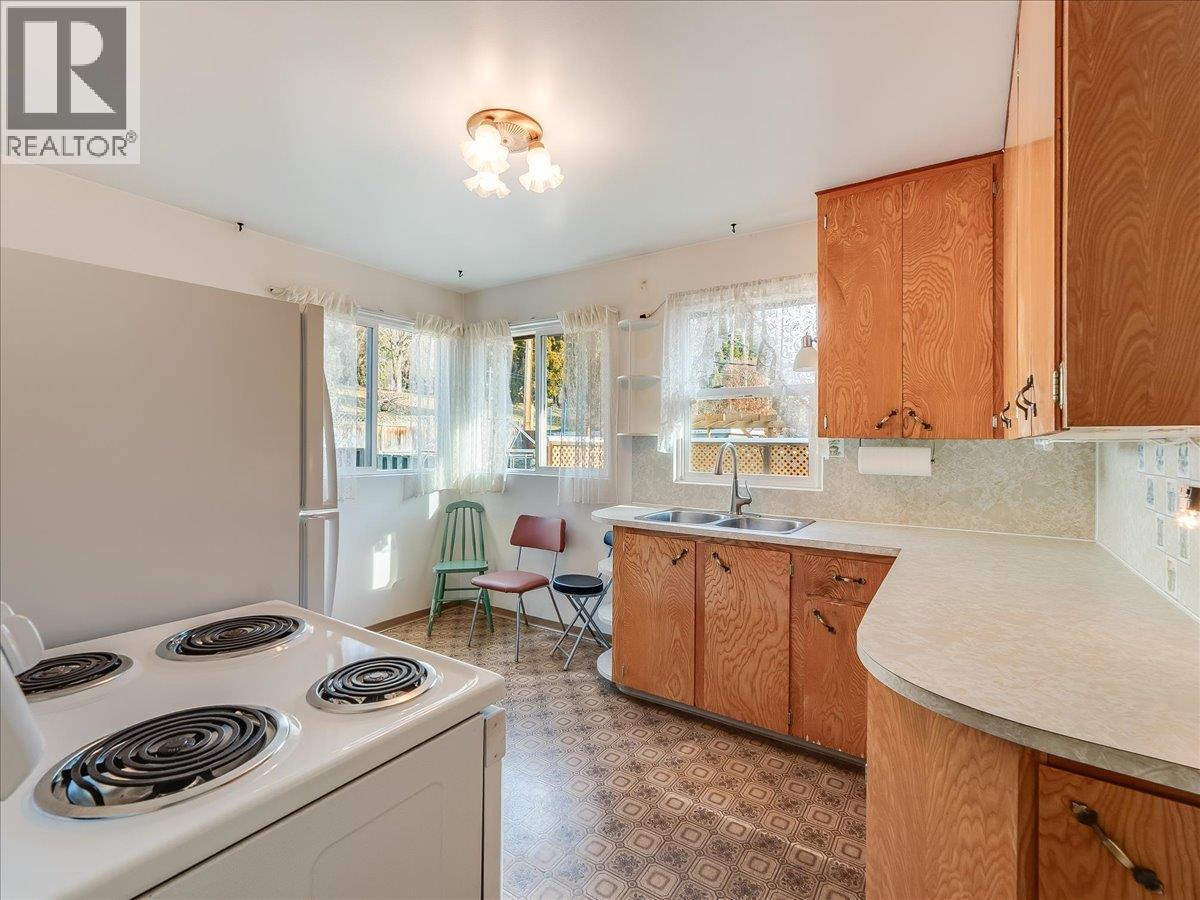 3201 Highway Drive, Trail, BC - Indoor Photo Showing Kitchen With Double Sink