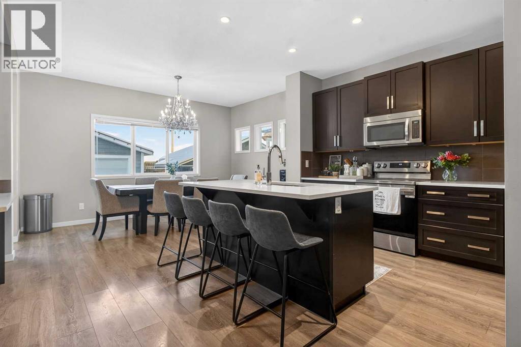 146 Marquis Common Se, Calgary, AB - Indoor Photo Showing Kitchen With Upgraded Kitchen