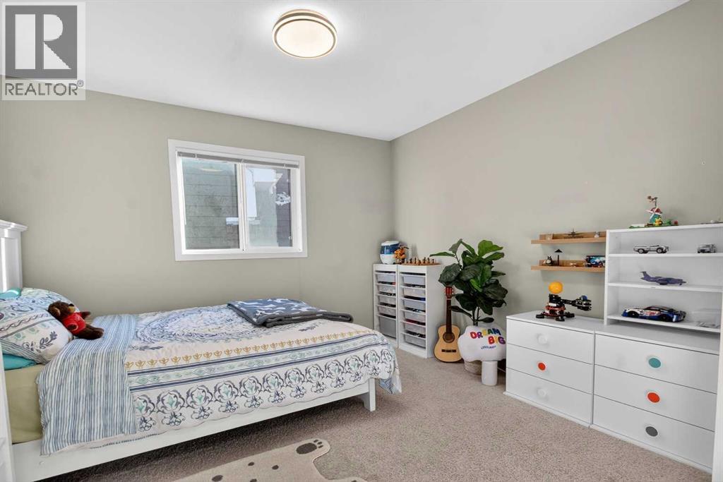 146 Marquis Common Se, Calgary, AB - Indoor Photo Showing Bedroom