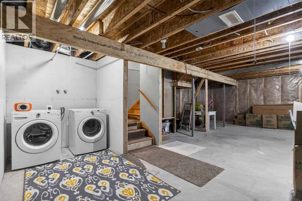 146 Marquis Common Se, Calgary, AB - Indoor Photo Showing Laundry Room