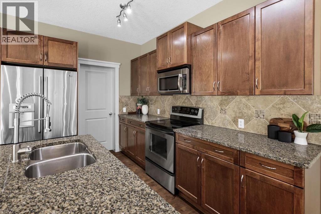 133 Sage Valley Close Nw, Calgary, AB - Indoor Photo Showing Kitchen With Stainless Steel Kitchen With Double Sink