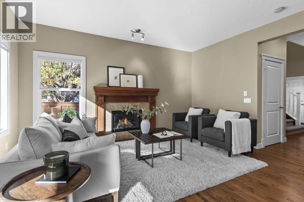 133 Sage Valley Close Nw, Calgary, AB - Indoor Photo Showing Living Room With Fireplace