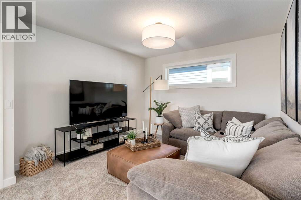 128 Quartz Crescent, Cochrane, AB - Indoor Photo Showing Living Room
