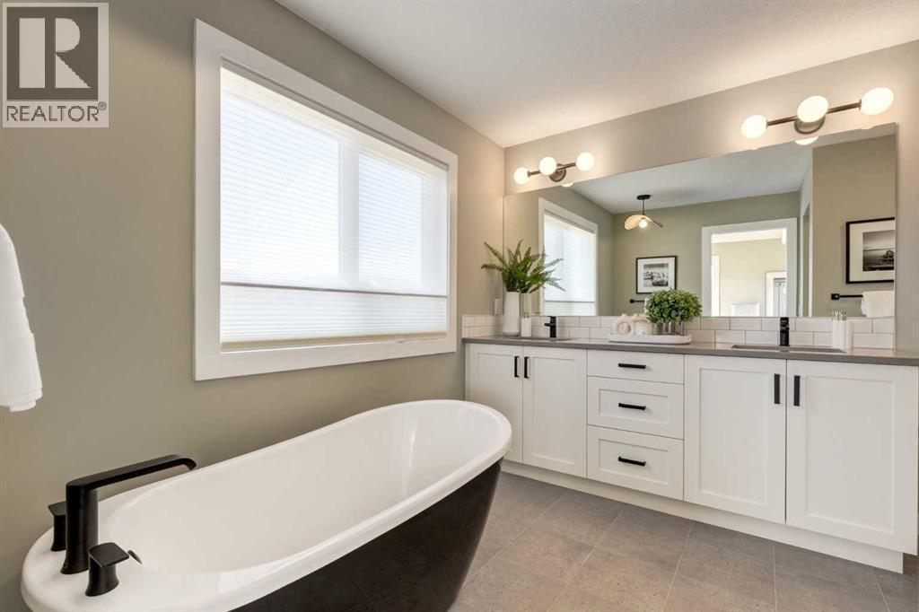 128 Quartz Crescent, Cochrane, AB - Indoor Photo Showing Bathroom