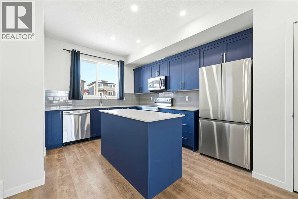 185 Edith Green Nw, Calgary, AB - Indoor Photo Showing Kitchen With Stainless Steel Kitchen With Upgraded Kitchen